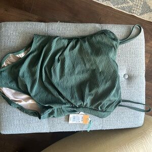 Green one piece bathing suit